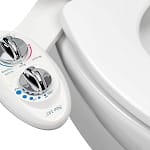 Close-up of a bidet control panel featuring adjustable water temperature and pressure settings.