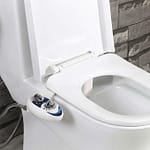 White bidet toilet attachment with control panel on the side, featuring two knobs for water control.