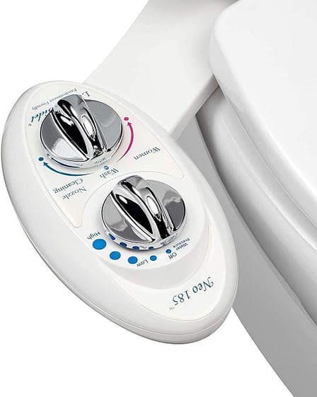 Close-up of a bidet control panel featuring adjustable water temperature and pressure settings.