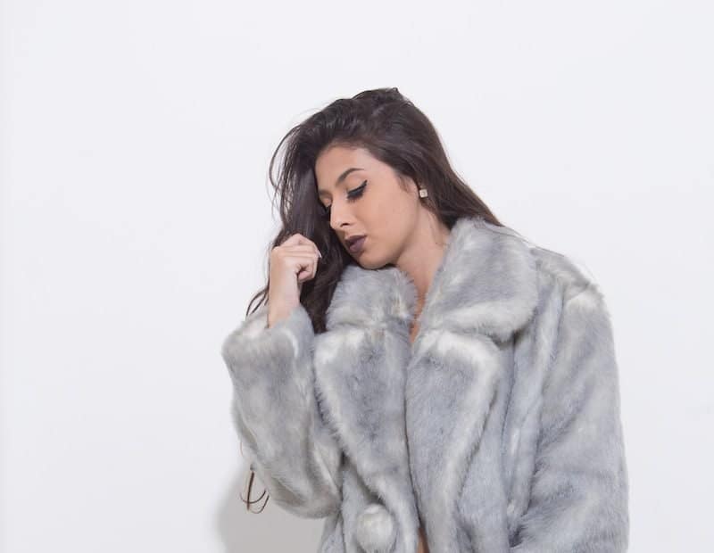 woman in gray fur coat